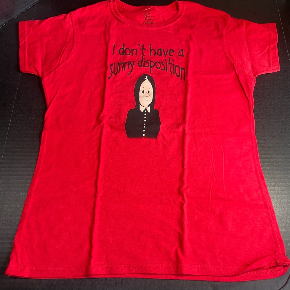 RARE! BNWOT ADDAMS FAMILY MUSICAL WEDNESDAY ADAMS TSHIRT WOMENS XL MADE SMALL.